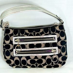 Coach black and silver smaller handbag.